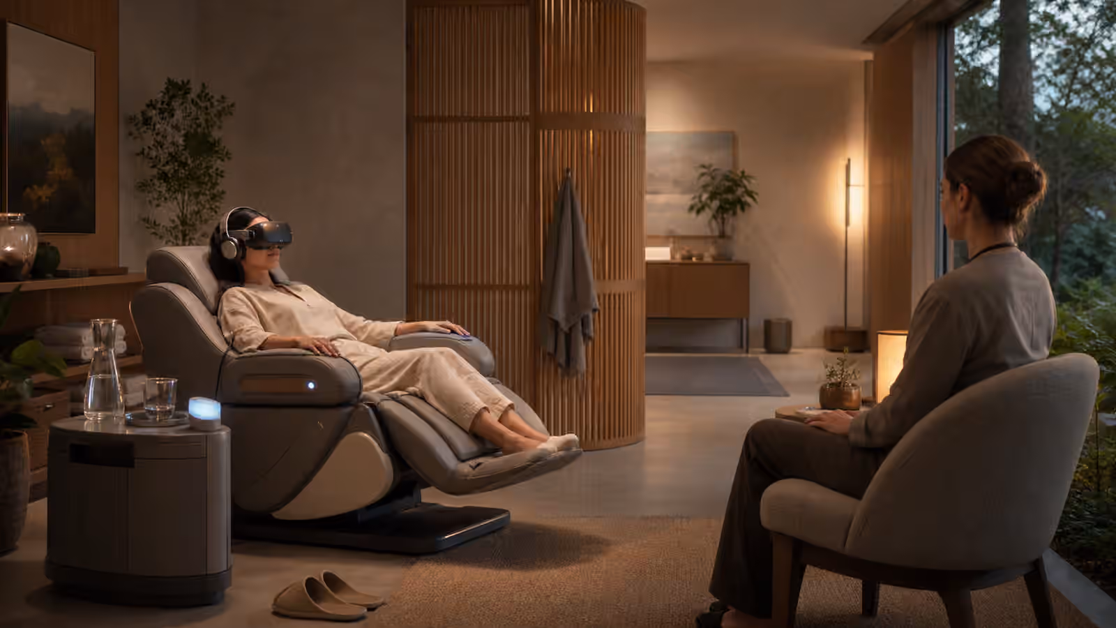 A quiet full dive VR support room with a reclining chair, water nearby, and a facilitator seated at a respectful distance.